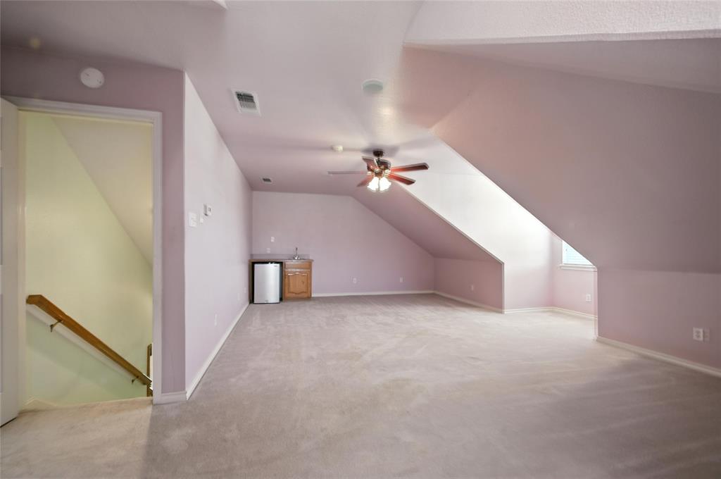 2134 Rains County Road 1402 Point, TX 75472 - Photo 21 of 26 a view of a big room with closet and a ceiling fan
