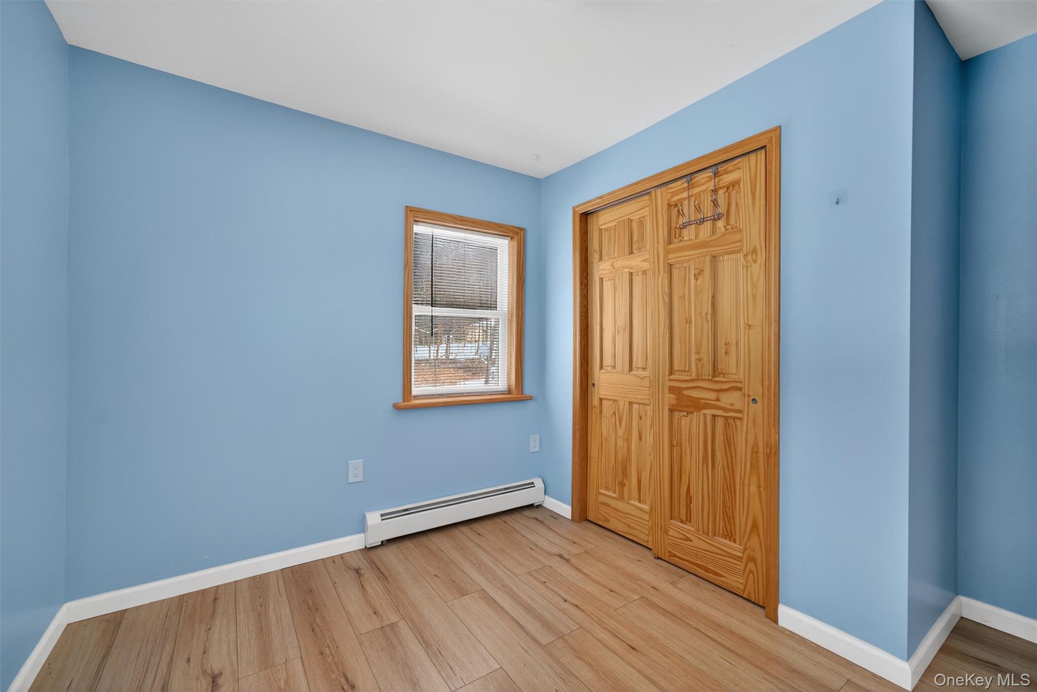 3 Old Country Road Otisville, NY 10963 - Photo 32 of 50 an empty room with wooden floor and windows