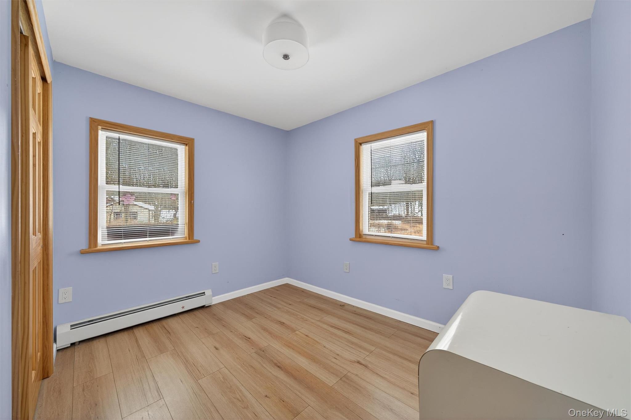 3 Old Country Road Otisville, NY 10963 - Photo 33 of 50 a view of an empty room with wooden floor and a window
