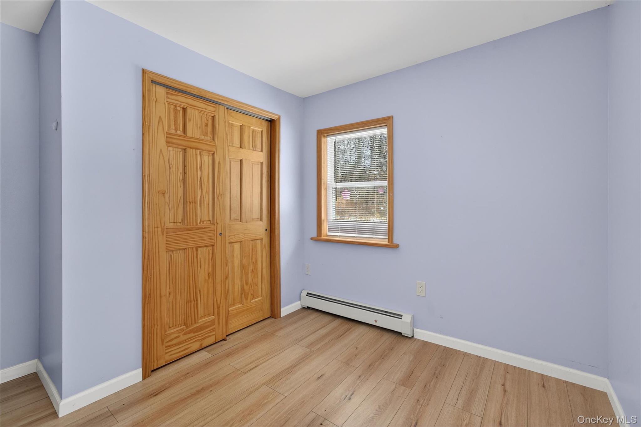 3 Old Country Road Otisville, NY 10963 - Photo 34 of 50 an empty room with wooden floor and windows