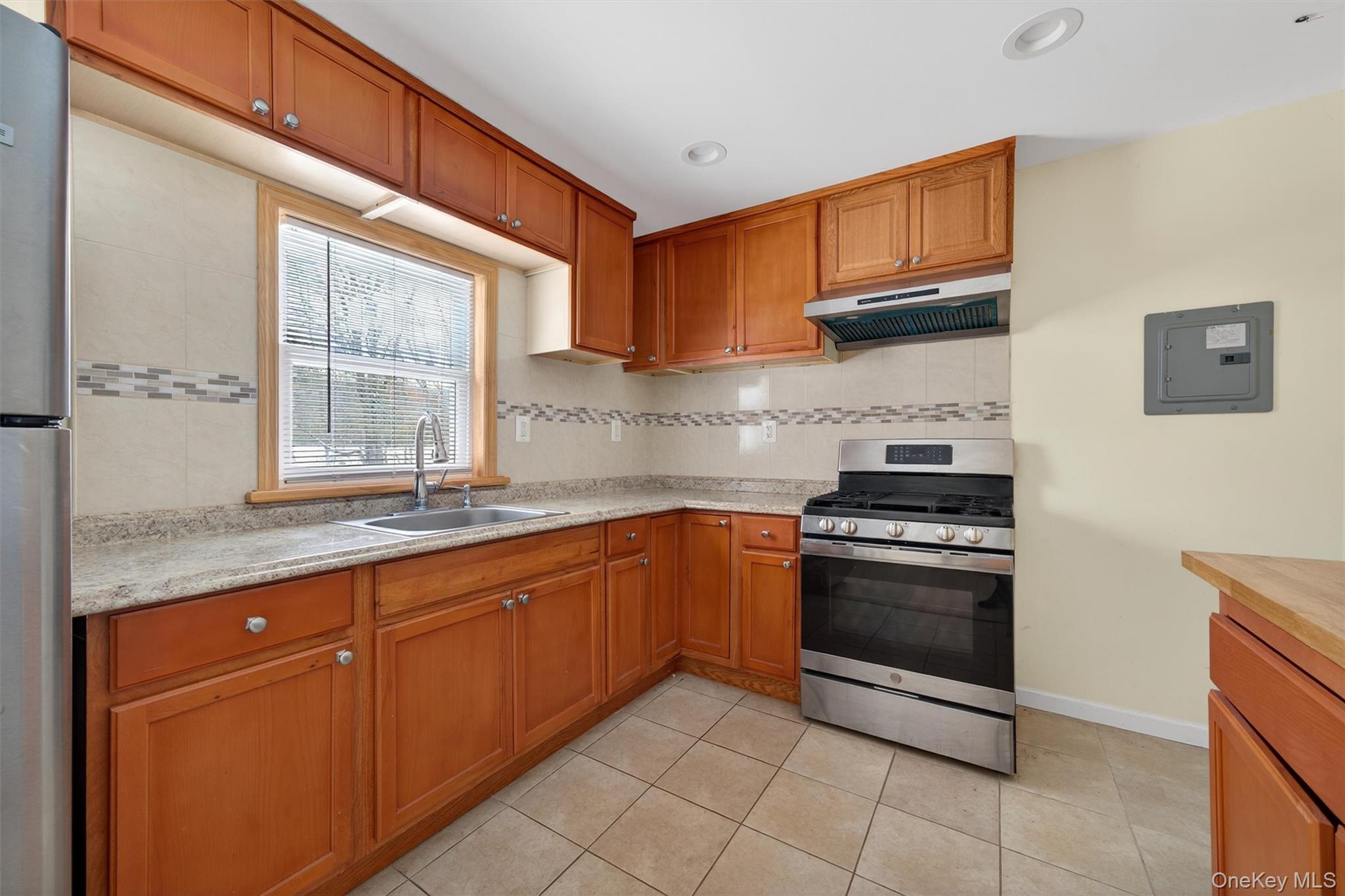 3 Old Country Road Otisville, NY 10963 - Photo 39 of 50 a kitchen with stainless steel appliances granite countertop a sink stove and cabinets