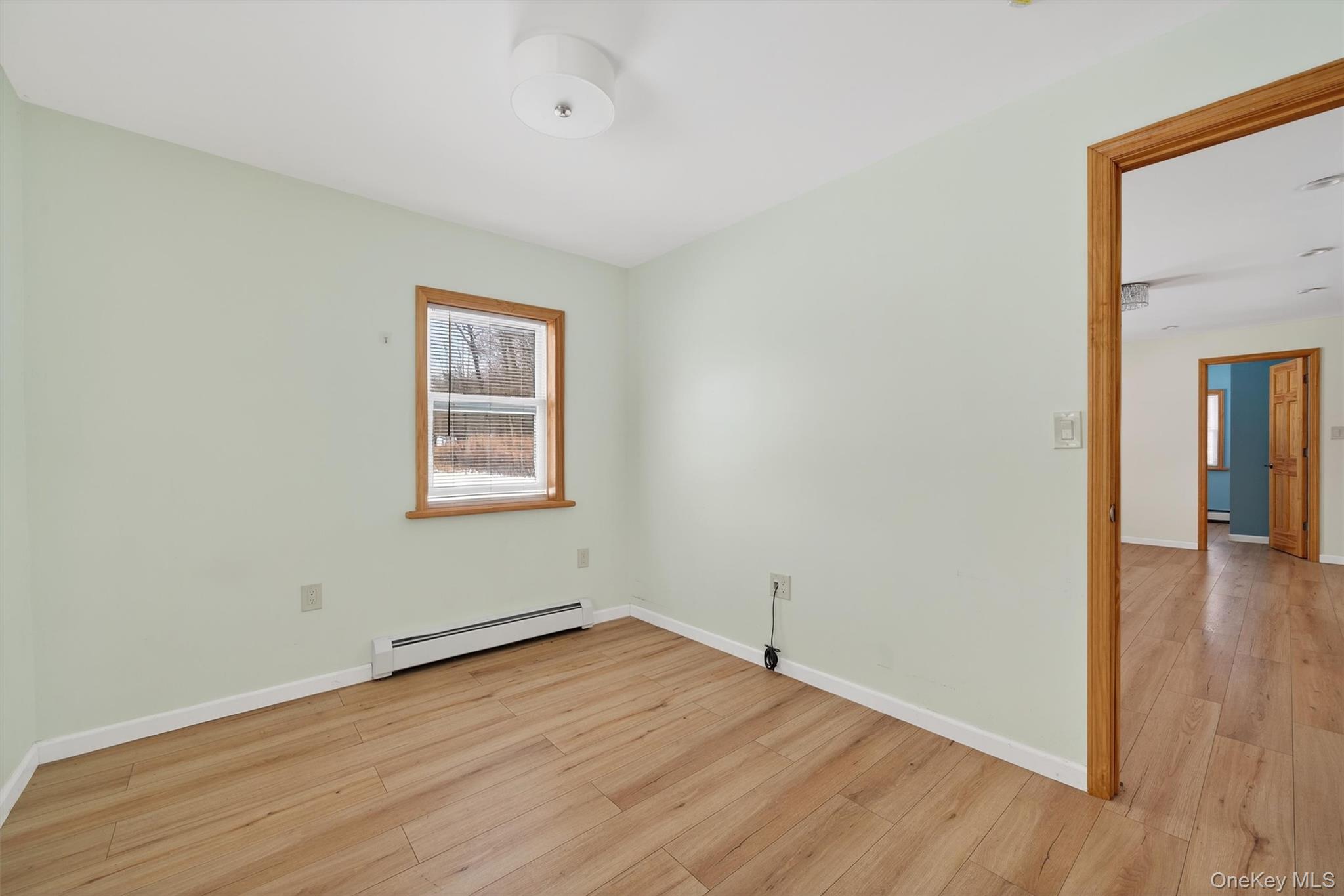 3 Old Country Road Otisville, NY 10963 - Photo 42 of 50 an empty room with wooden floor and windows