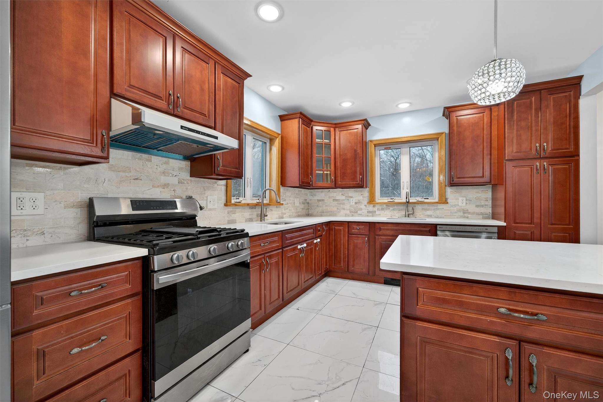 3 Old Country Road Otisville, NY 10963 - Photo 9 of 50 a kitchen with stainless steel appliances granite countertop wooden cabinets stove top oven and sink
