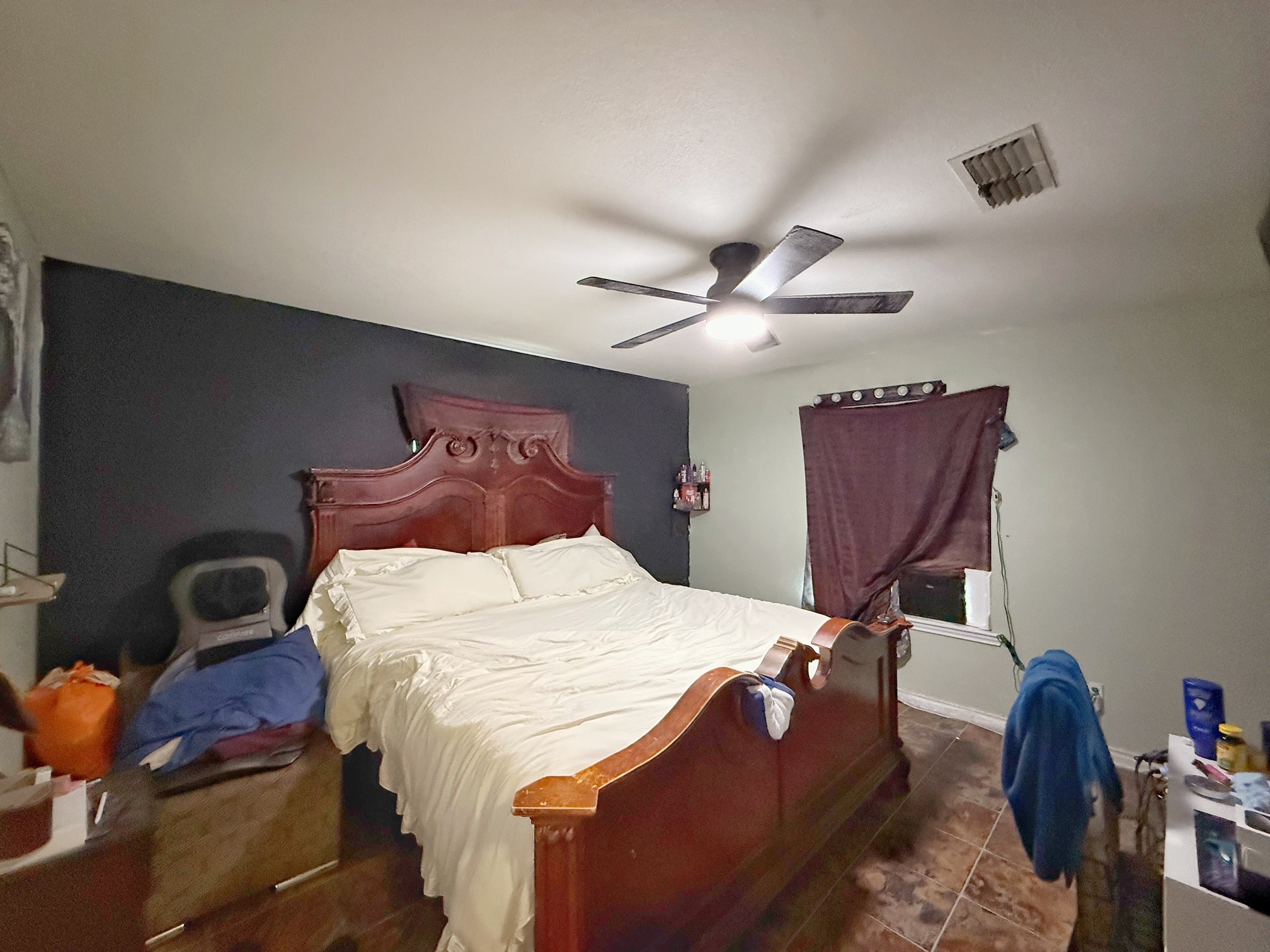 935 Center Street Buffalo, TX 75831 - Photo 11 of 18 a bedroom with bed and wooden floor