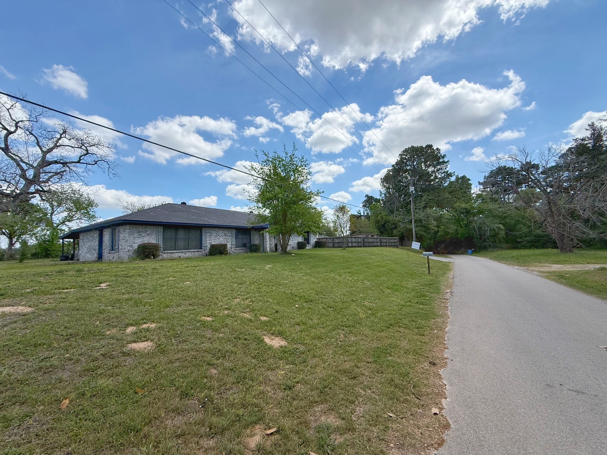 935 Center Street Buffalo, TX 75831 - Photo 2 of 18 a view of a house with a big yard