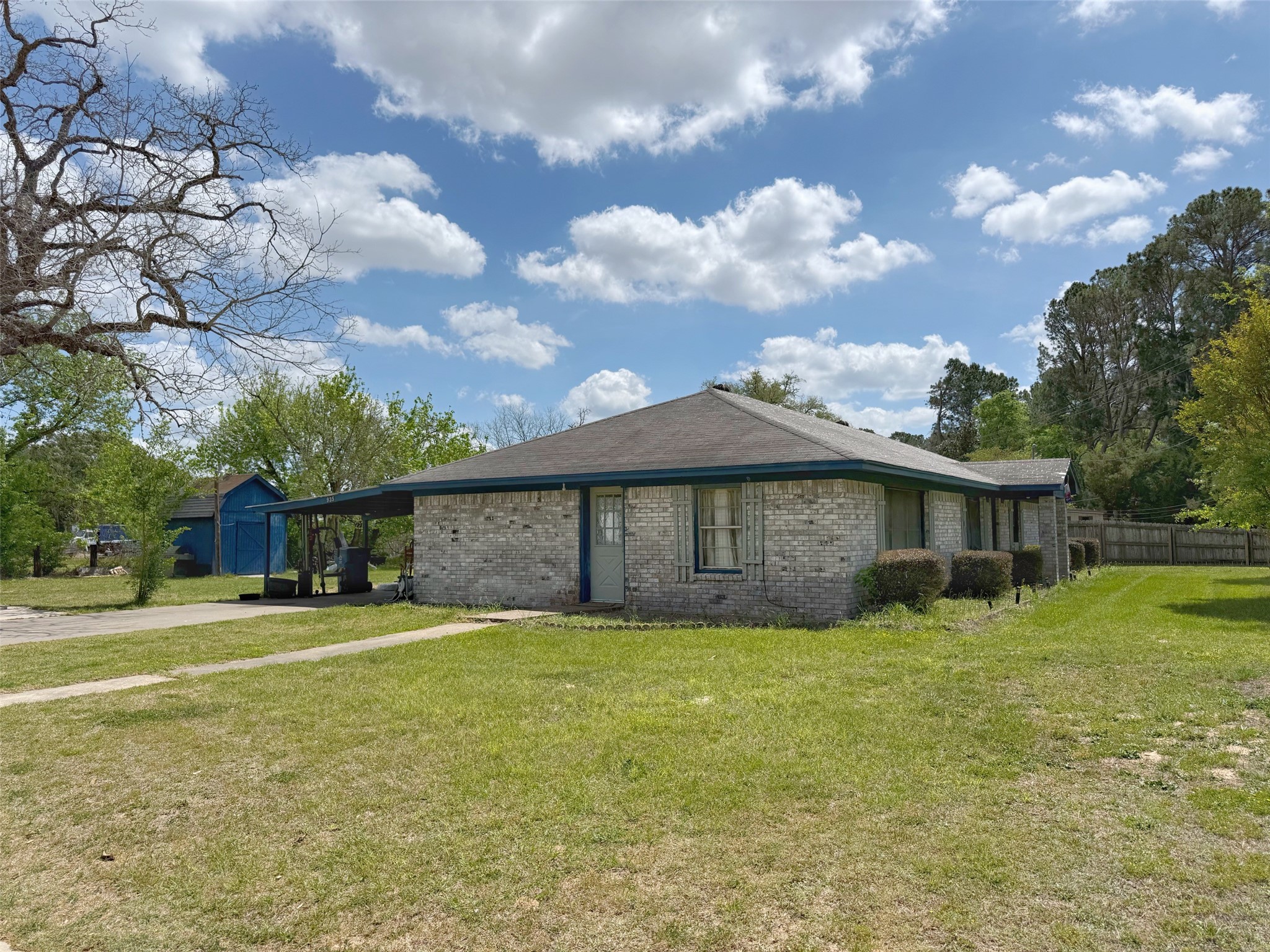 935 Center Street Buffalo, TX 75831 - Photo 3 of 18 a view of a house with a yard