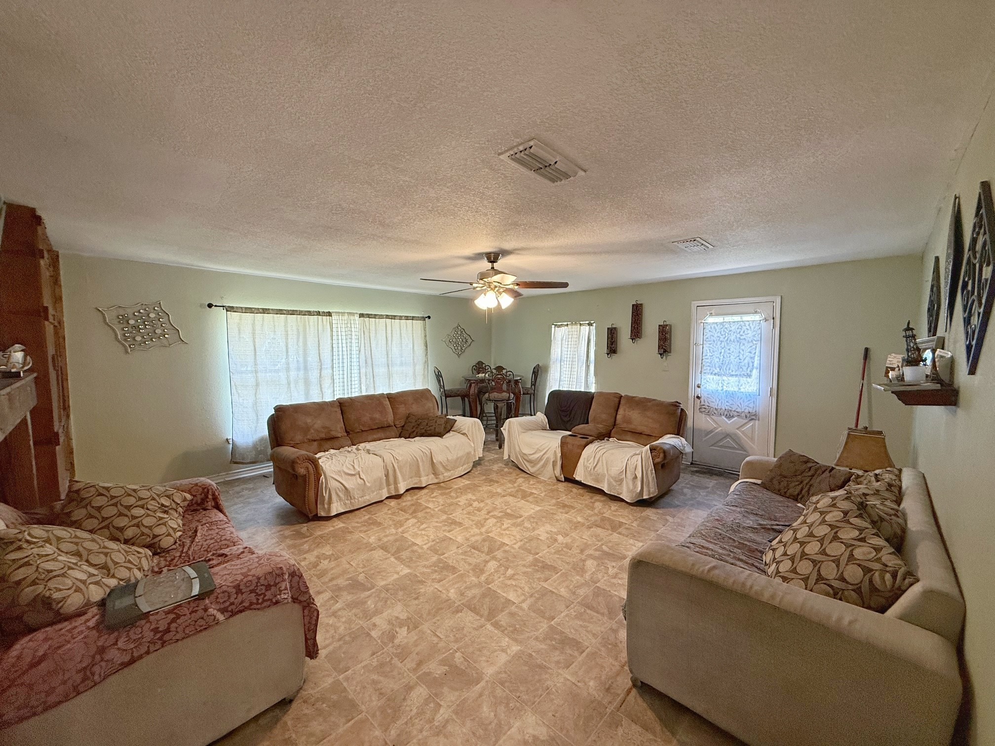 935 Center Street Buffalo, TX 75831 - Photo 10 of 18 a bedroom with furniture and a couch