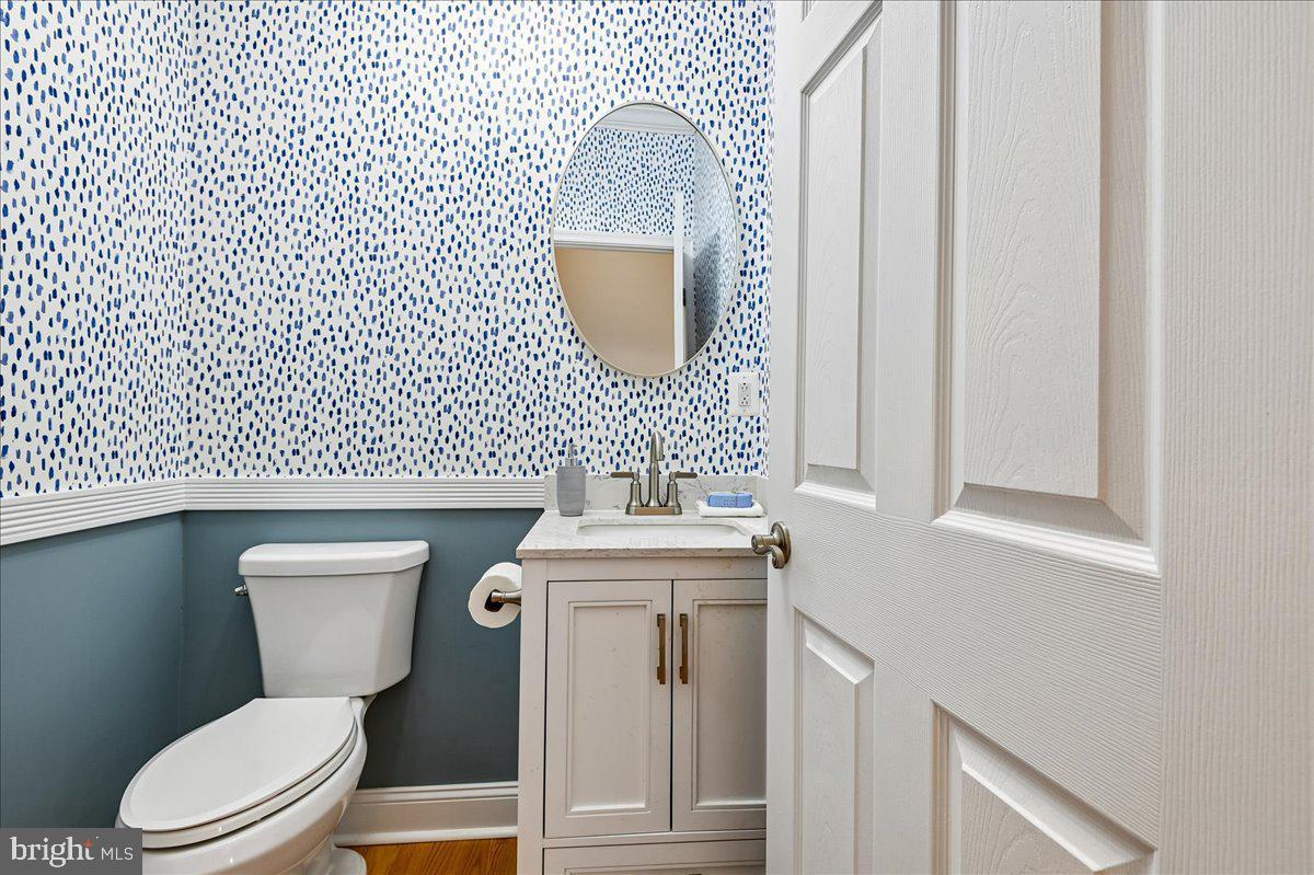 603 Queenstown Road Severn, MD 21144 - Photo 21 of 85 Charming half-bath with playful decor.
