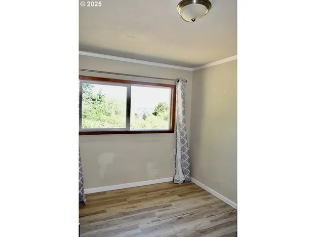 a kitchen with a sink and a stove