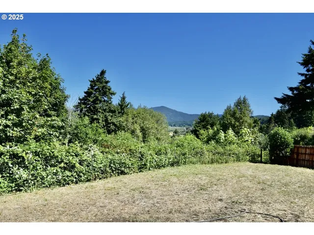 a view of room with window and closet