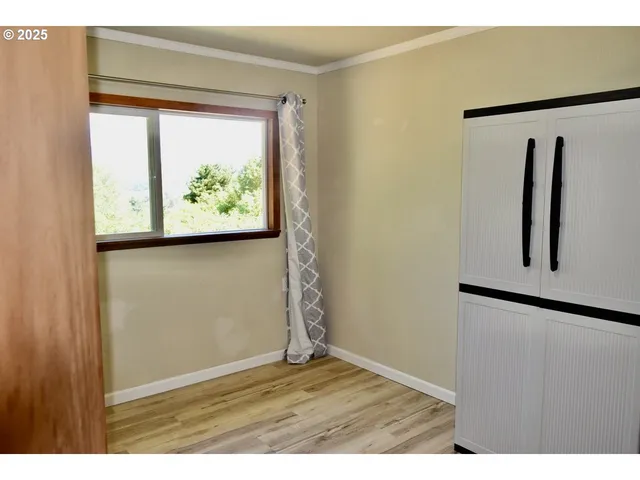 a view of a wooden fence