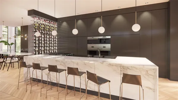 a kitchen with a sink a table and chairs