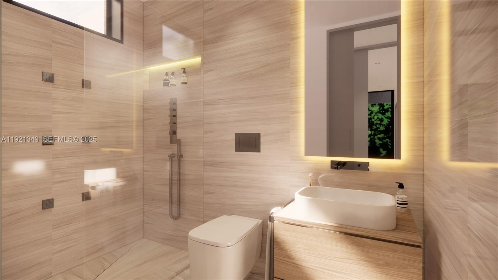 6020 Alton Road Miami Beach, FL 33140 - Photo 7 of 7 a bathroom with a sink toilet and shower