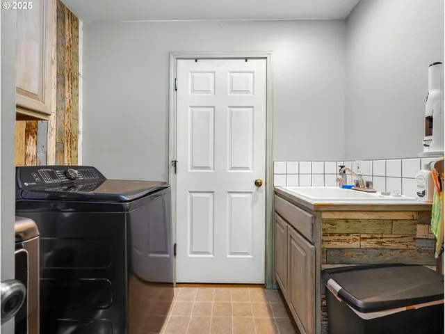 a kitchen with a stove and a cabinets