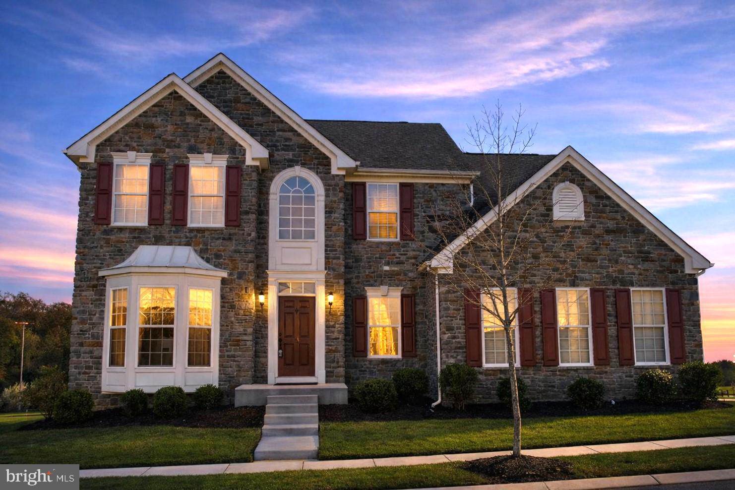 5111 Honeybrook Way Perry Hall, MD 21128 - Photo 2 of 20 a front view of a house with a yard