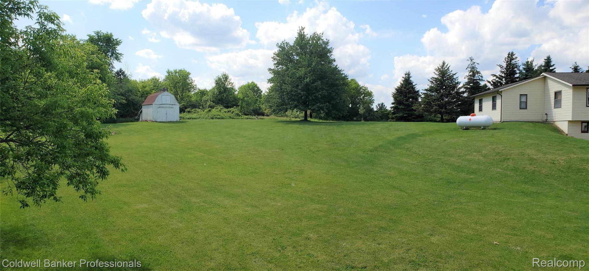 2040 Hasler Lake Road Lapeer, MI 48446 - Photo 13 of 38 Yard Looking West