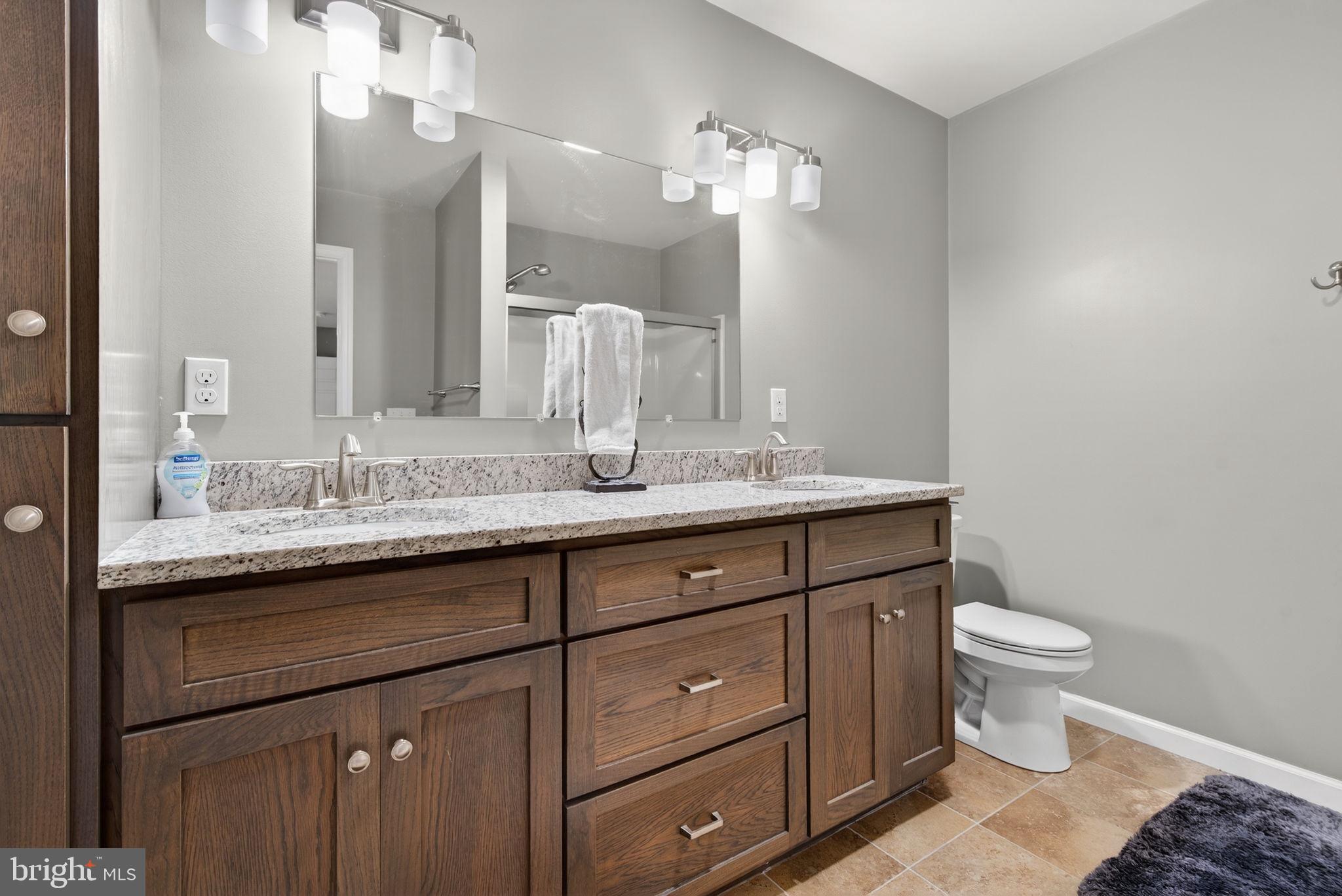 849 Sugar Run Road Millerstown, PA 17062 - Photo 16 of 34 a bathroom with a sink and a toilet