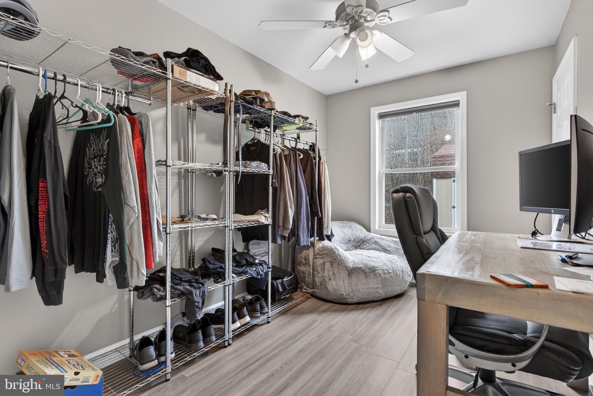 849 Sugar Run Road Millerstown, PA 17062 - Photo 17 of 34 a bedroom with furniture and a window