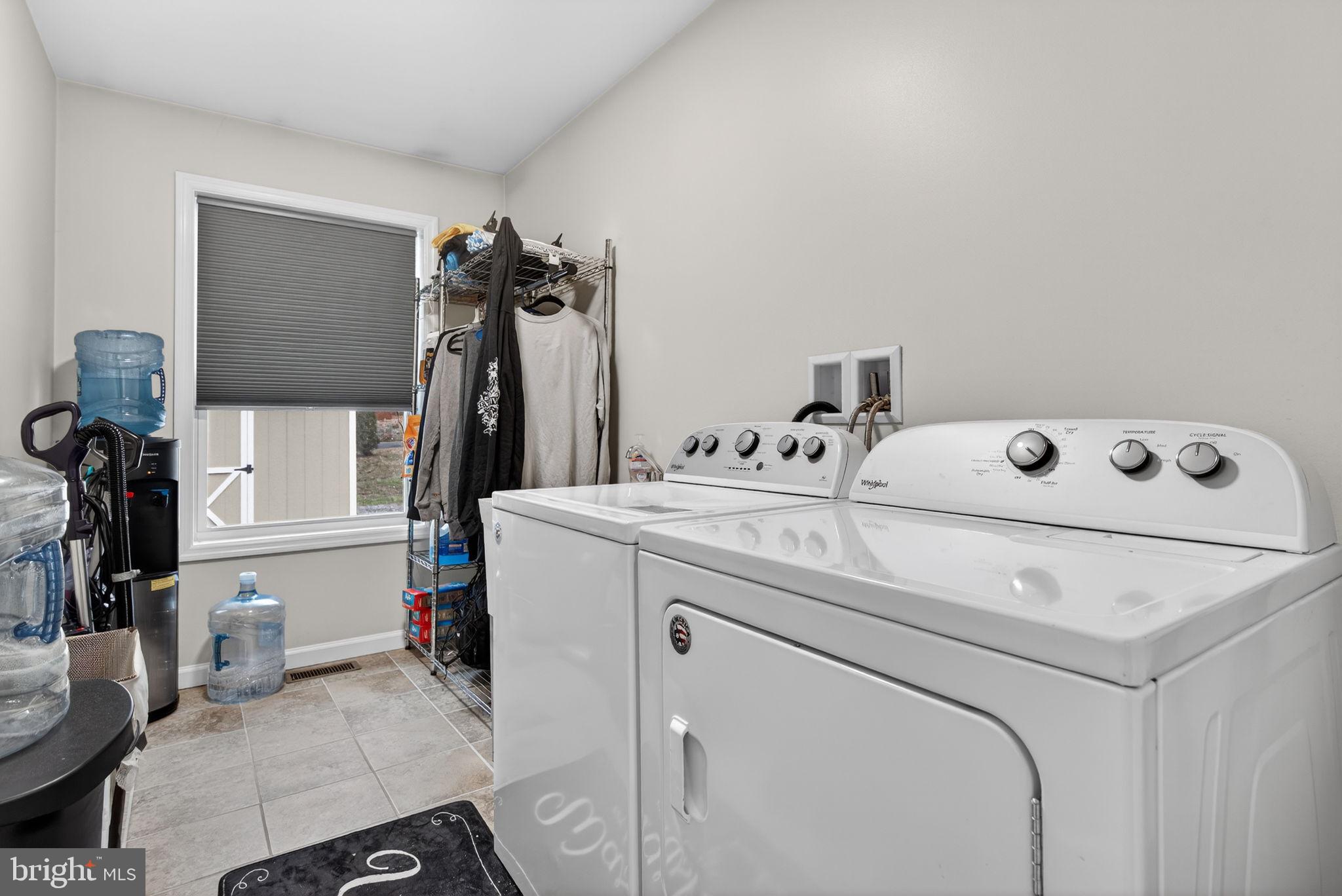 849 Sugar Run Road Millerstown, PA 17062 - Photo 22 of 34 a utility room with dryer and washer