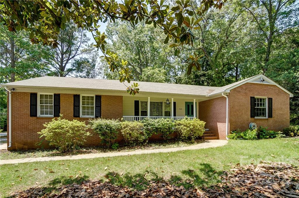 502 Plantation Road Lancaster, SC 29720 - Photo 1 of 44 a front view of house with yard and green space