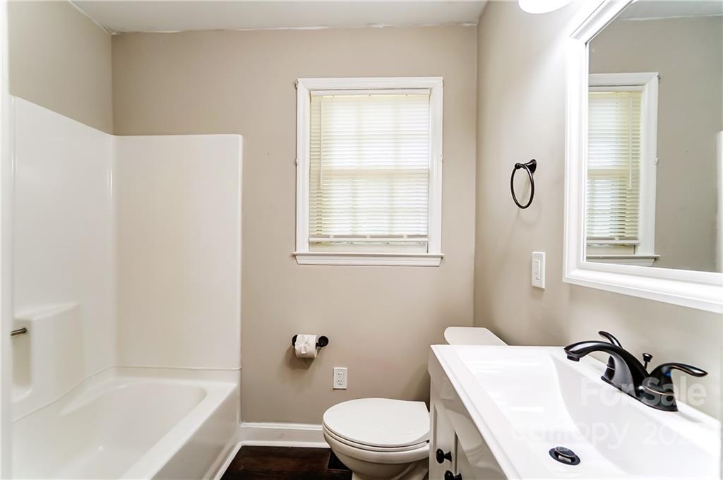 502 Plantation Road Lancaster, SC 29720 - Photo 29 of 44 a bathroom with a sink and a toilet