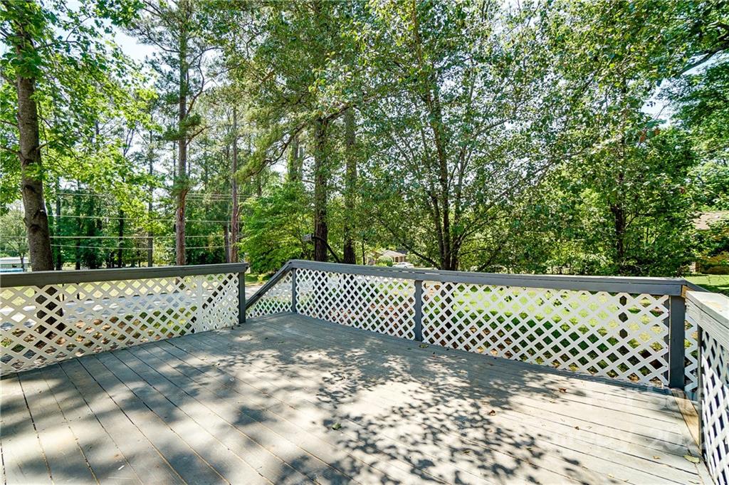 502 Plantation Road Lancaster, SC 29720 - Photo 41 of 44 a view of a bench in the garden