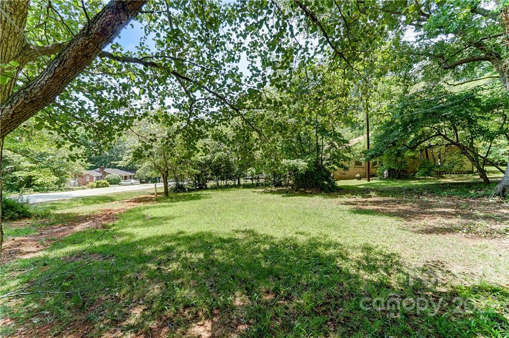 502 Plantation Road Lancaster, SC 29720 - Photo 42 of 44 a view of outdoor space with deck and trees