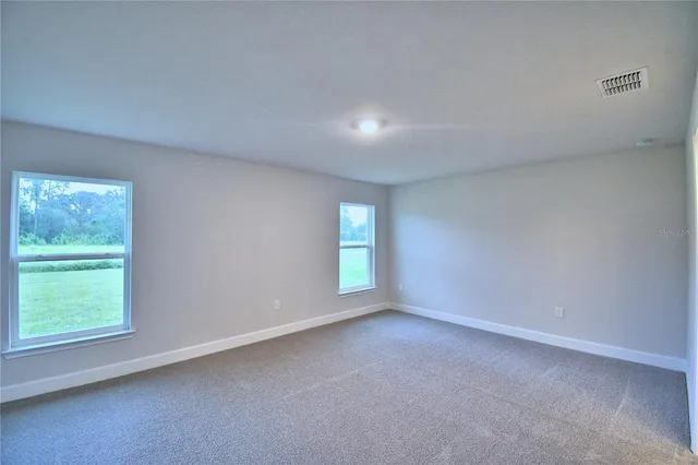 a bathroom with a tub a sink and a shower