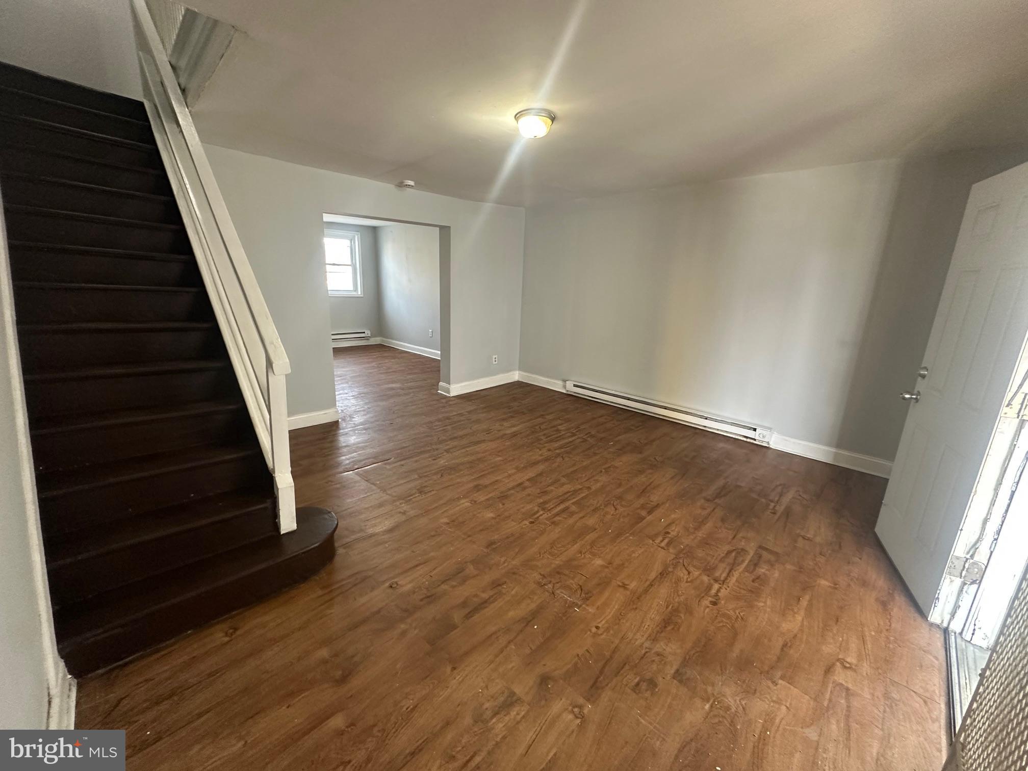 609 North Wilton Street Philadelphia, PA 19131 - Photo 8 of 15 wooden floor in an empty room with wooden floor