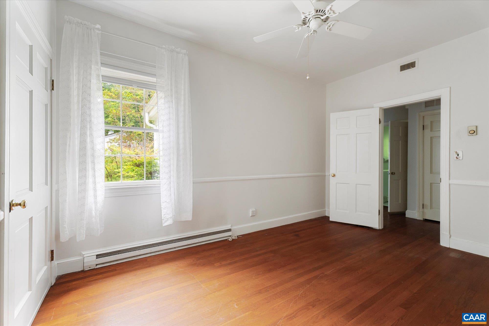 13320 Hackberry Road Orange, VA 22960 - Photo 12 of 47 an empty room with wooden floor and windows