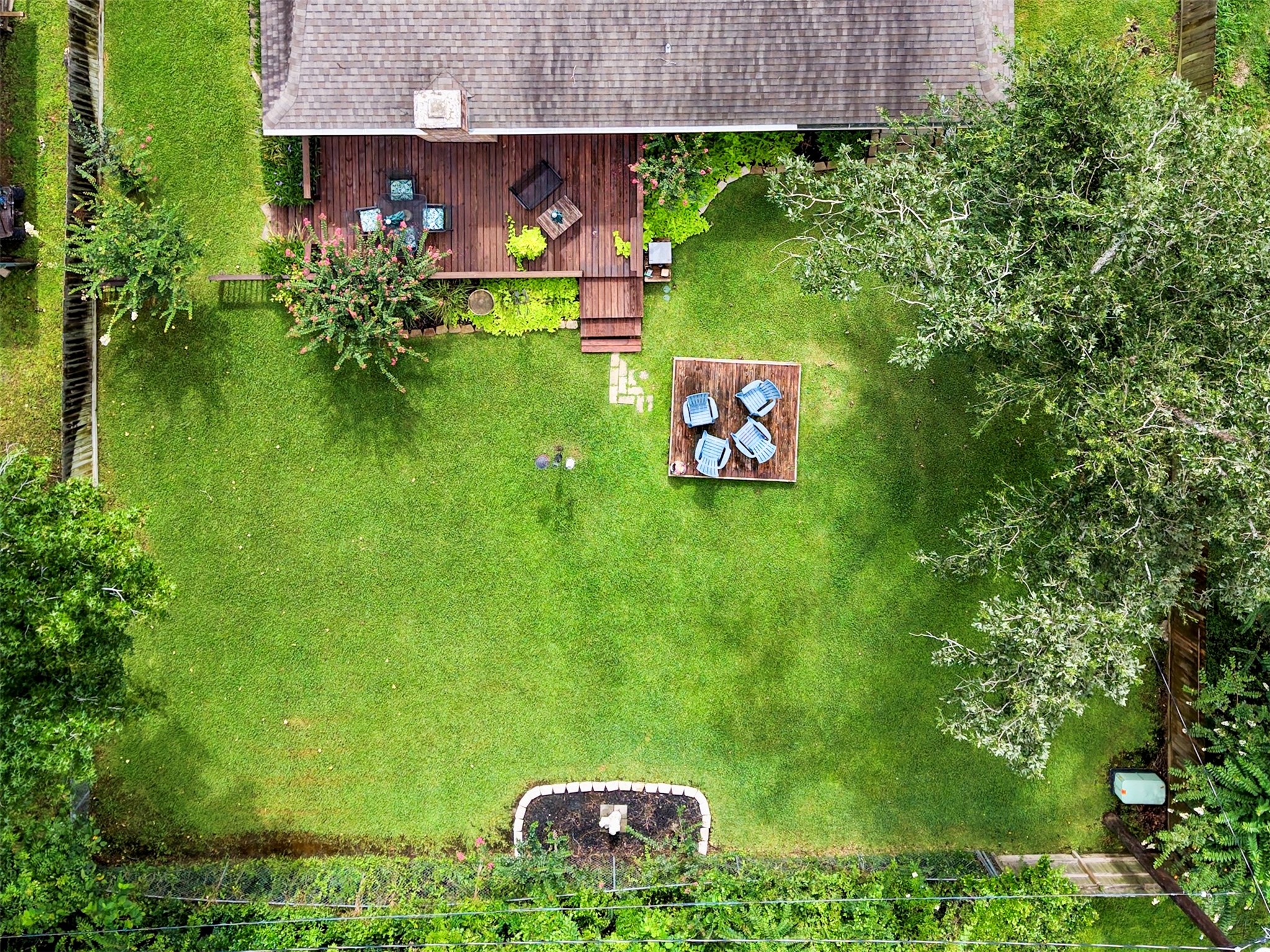 24719 Wilderness Road Spring, TX 77380 - Photo 35 of 42 Aerial view of backyard deck and sitting area