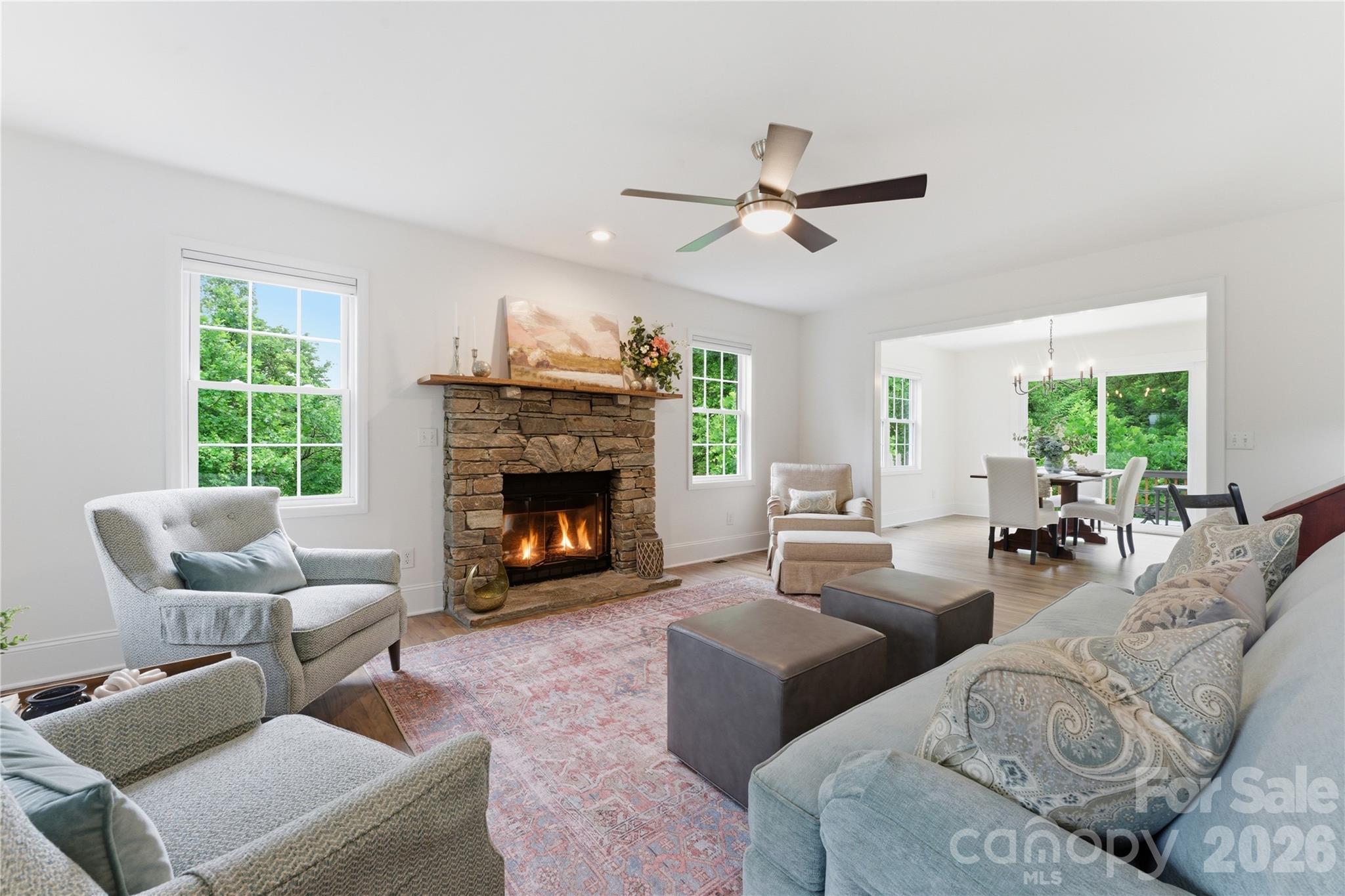 15 Raccoon Point Canton, NC 28716 - Photo 11 of 48 a living room with furniture and a fireplace