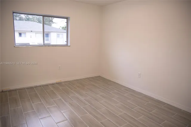 an empty room with a window