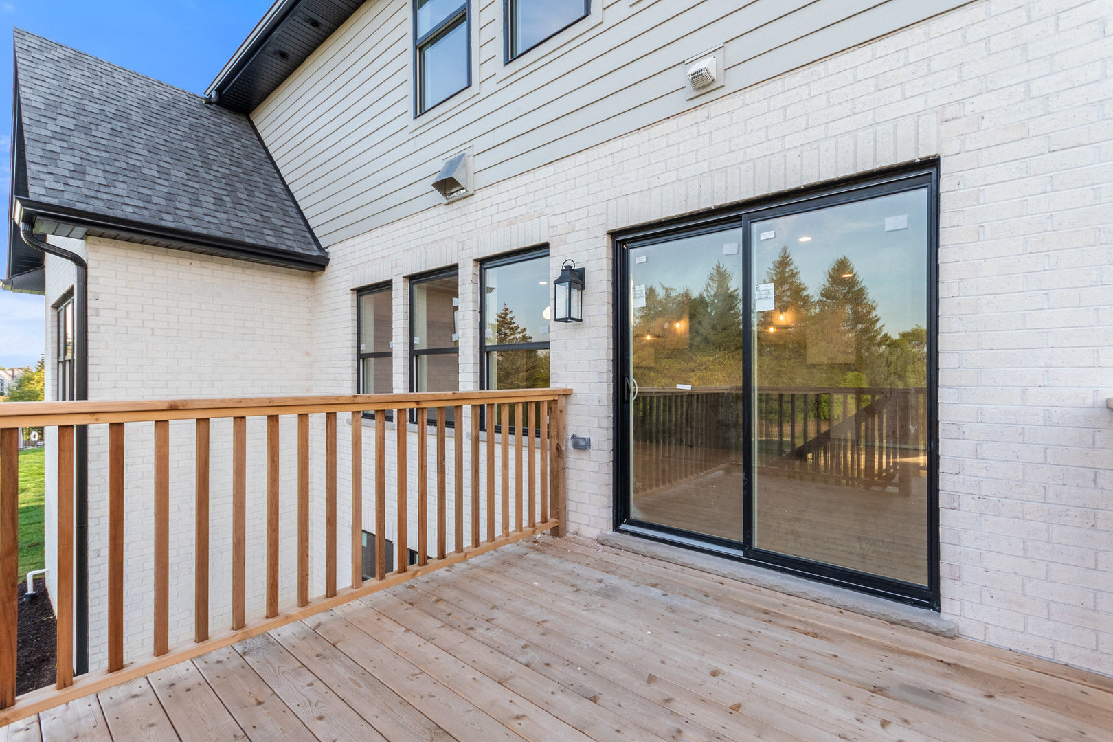 1519 77th Street Naperville, IL 60565 - Photo 43 of 44 a view of a brick house with a large window