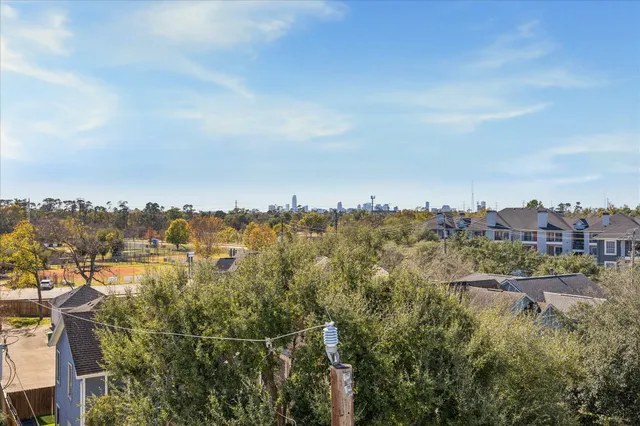 an aerial view of residential building with parking space