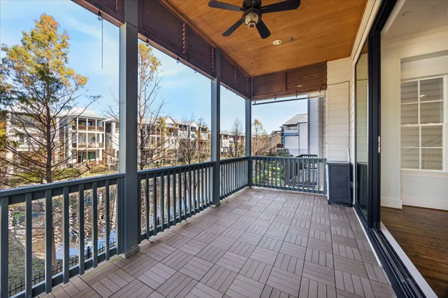 a view of a balcony with wooden floor