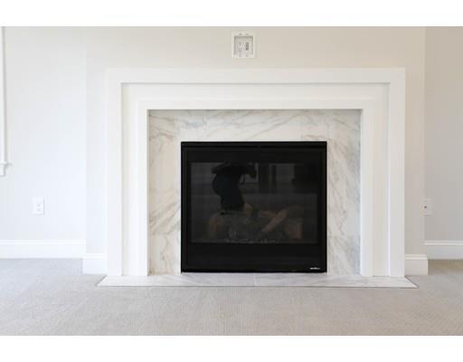 815 Main Street Acton, MA 01720 - Photo 11 of 27 a living room with a fireplace