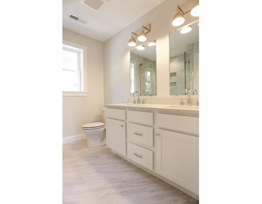 815 Main Street Acton, MA 01720 - Photo 17 of 27 a bathroom with a double vanity sink mirror and toilet