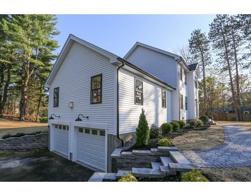 815 Main Street Acton, MA 01720 - Photo 2 of 27 a view of a house with backyard and garden