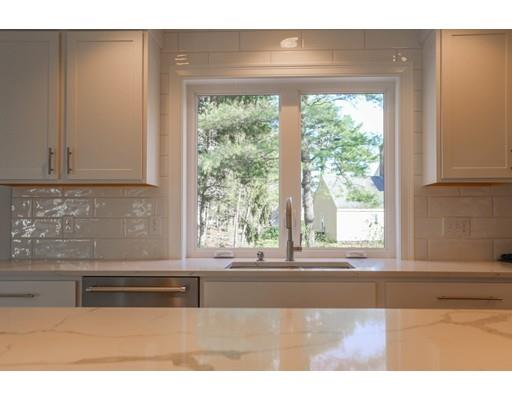 815 Main Street Acton, MA 01720 - Photo 7 of 27 a kitchen with a window cabinets and a counter top space