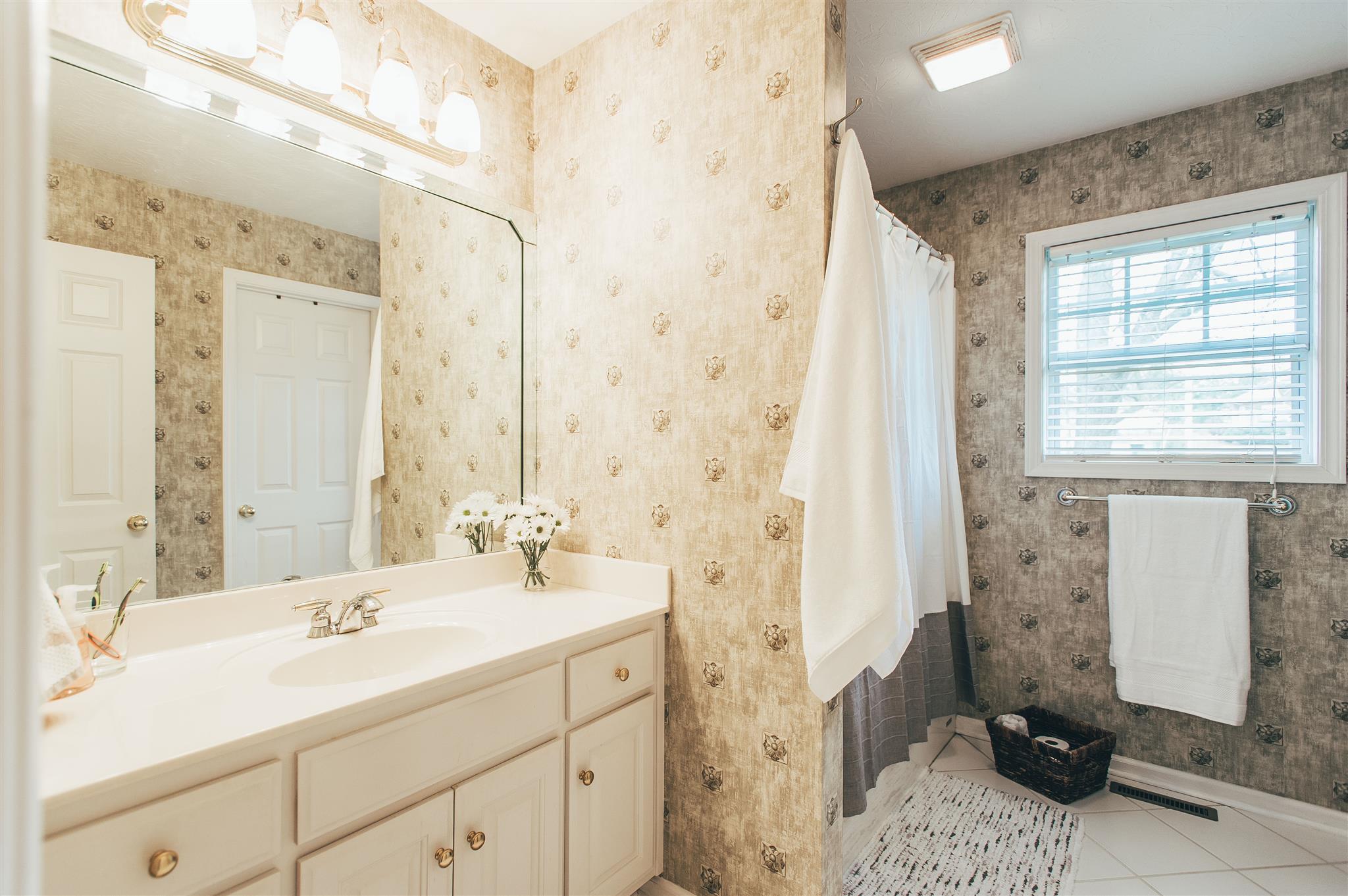 134 Abbey Road Gallatin, TN 37066 - Photo 17 of 18 a bathroom with a sink and a mirror