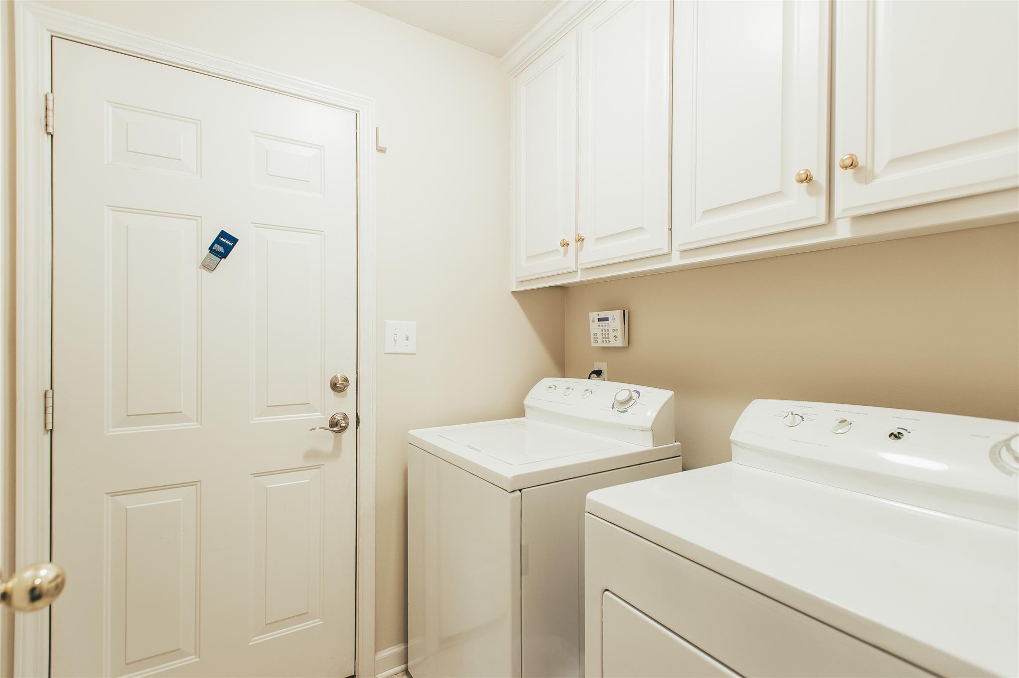 134 Abbey Road Gallatin, TN 37066 - Photo 18 of 18 a utility room with dryer and washer
