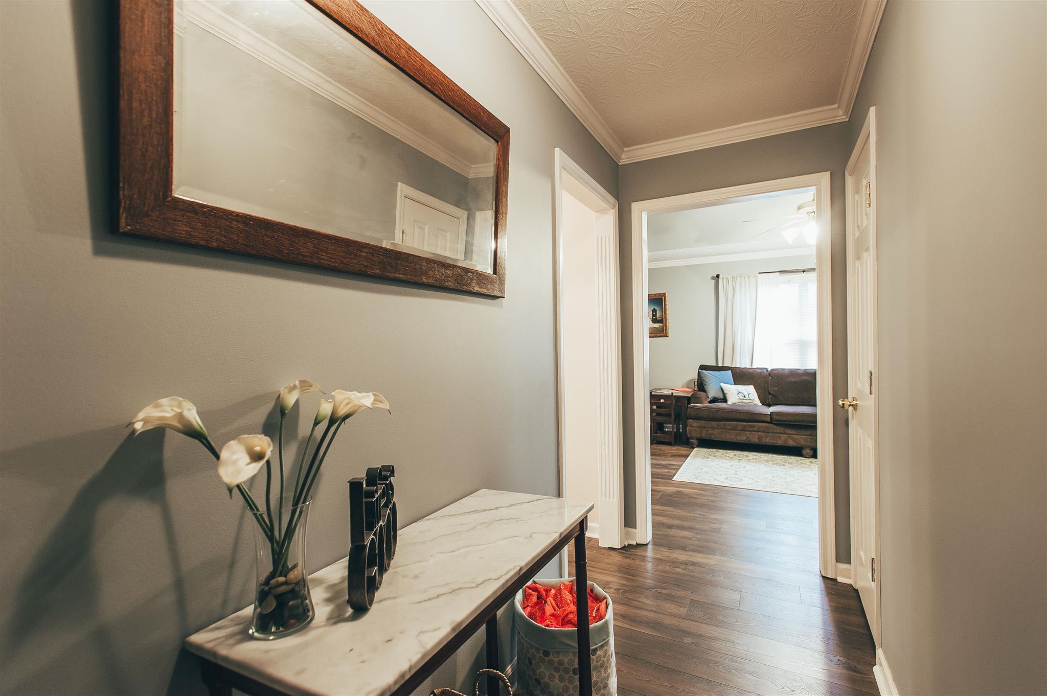 134 Abbey Road Gallatin, TN 37066 - Photo 10 of 18 a living room with furniture and a wooden floor