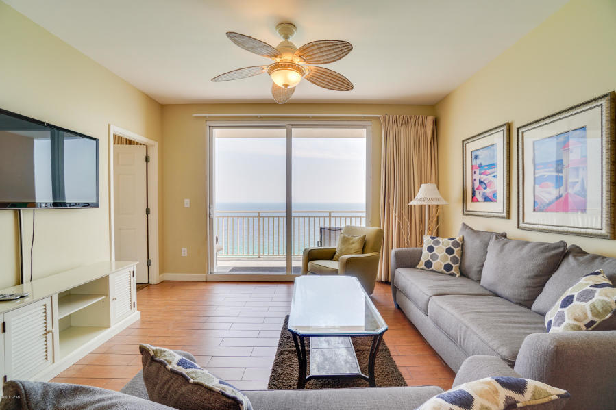 17739 Front Beach Road, Unit 1902W Panama City Beach, FL 32413 - Photo 2 of 30 a living room with furniture and a large window