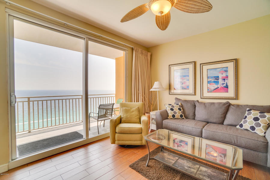 17739 Front Beach Road, Unit 1902W Panama City Beach, FL 32413 - Photo 3 of 30 a living room with furniture and a large window