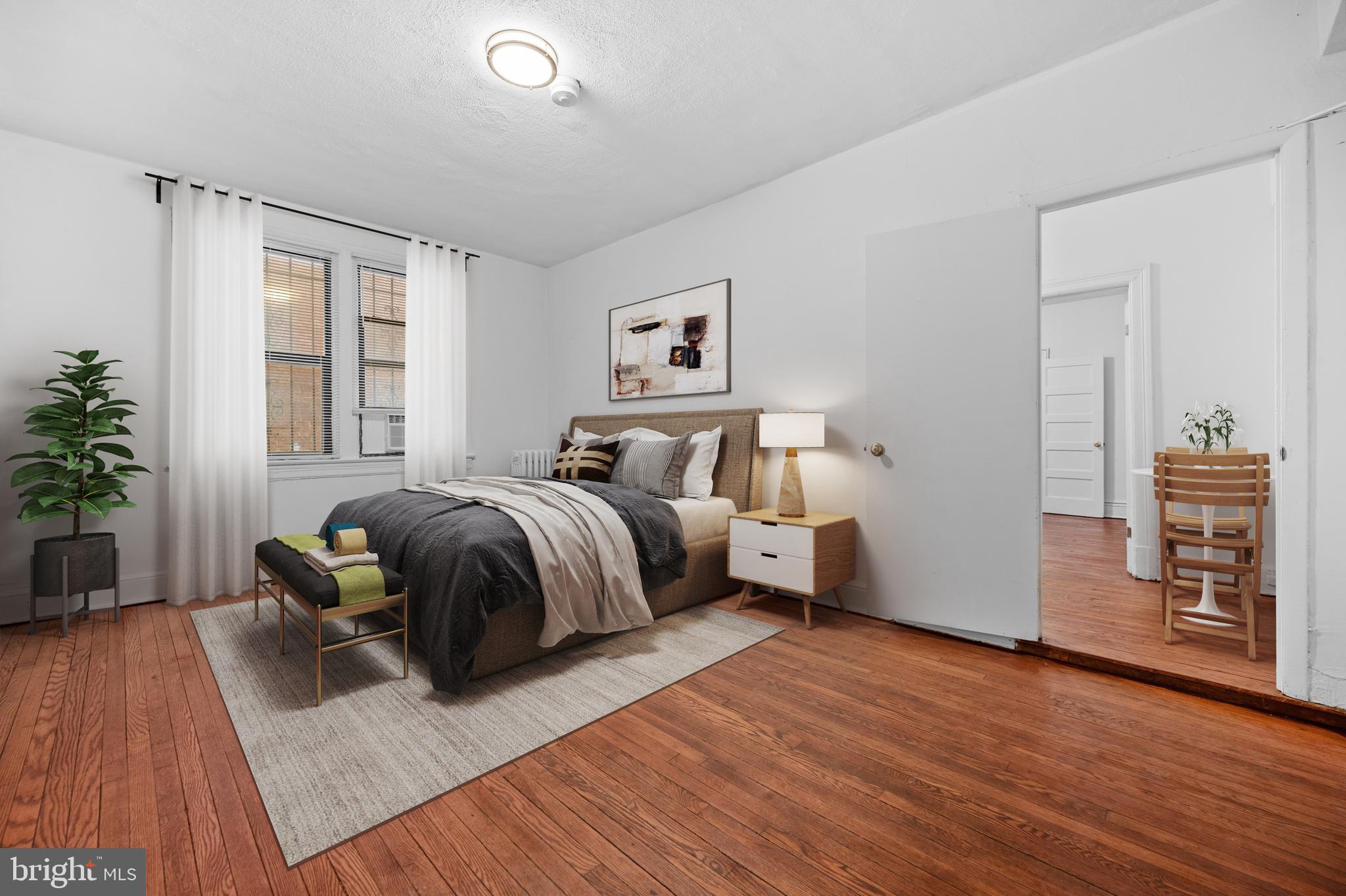 1457 Park Road Northwest, Unit 107 Washington, DC 20010 - Photo 22 of 42 Bedroom with virtual furniture.
