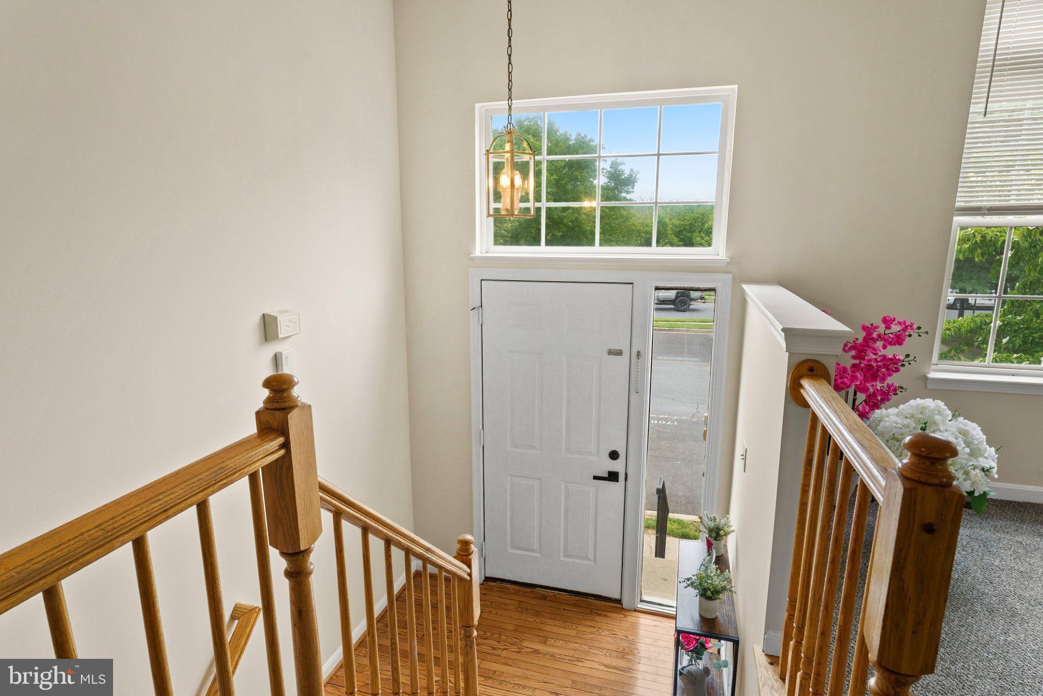 1709 Woodruff Way Frederick, MD 21701 - Photo 3 of 42 a view of an entryway wooden floor and a window