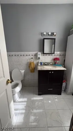 a bathroom with a toilet and a sink
