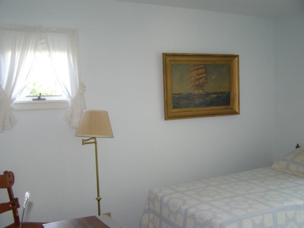 58 A Ocean Point Road, Unit A East Boothbay, ME 04544 - Photo 19 of 25 The first bedroom with double closet