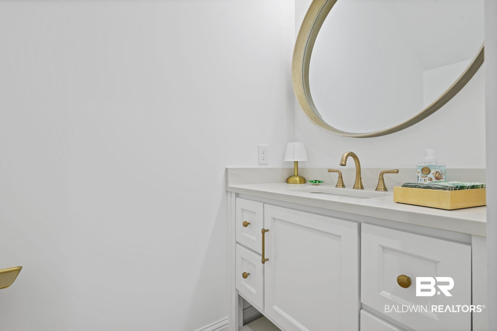 30313 River Road Orange Beach, AL 36561 - Photo 20 of 50 Bathroom with vanity